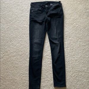 High waisted black distressed jeans